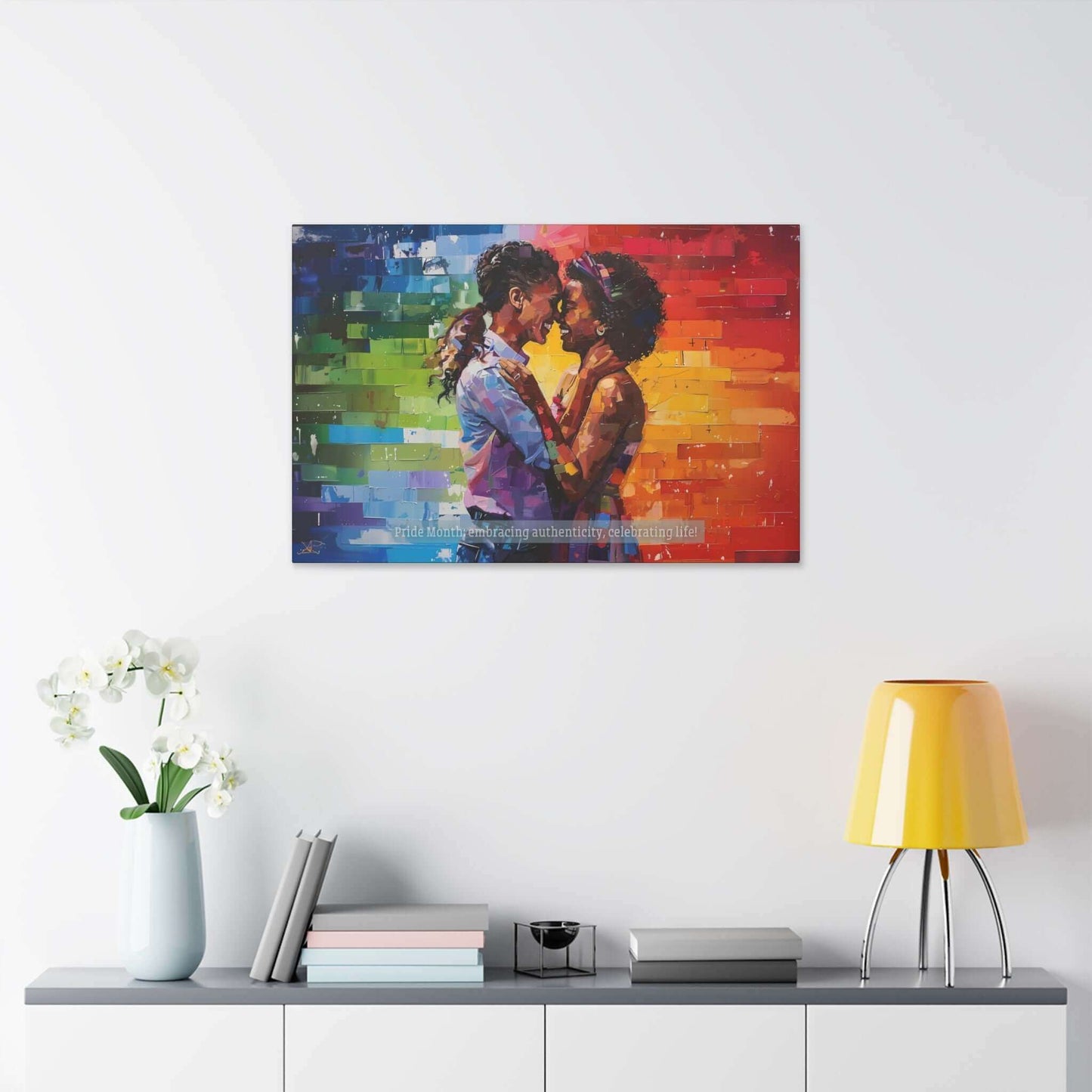 The Exuberant Gay Pride Canvas Wall Art by Printify depicts a romantic embrace between two women standing closely with their foreheads touching. The background features a vibrant rainbow of colors, symbolizing LGBTQ+ pride. Below them, the text reads "Pride Month: embracing authenticity, celebrating life within the LGBTQ+ community.