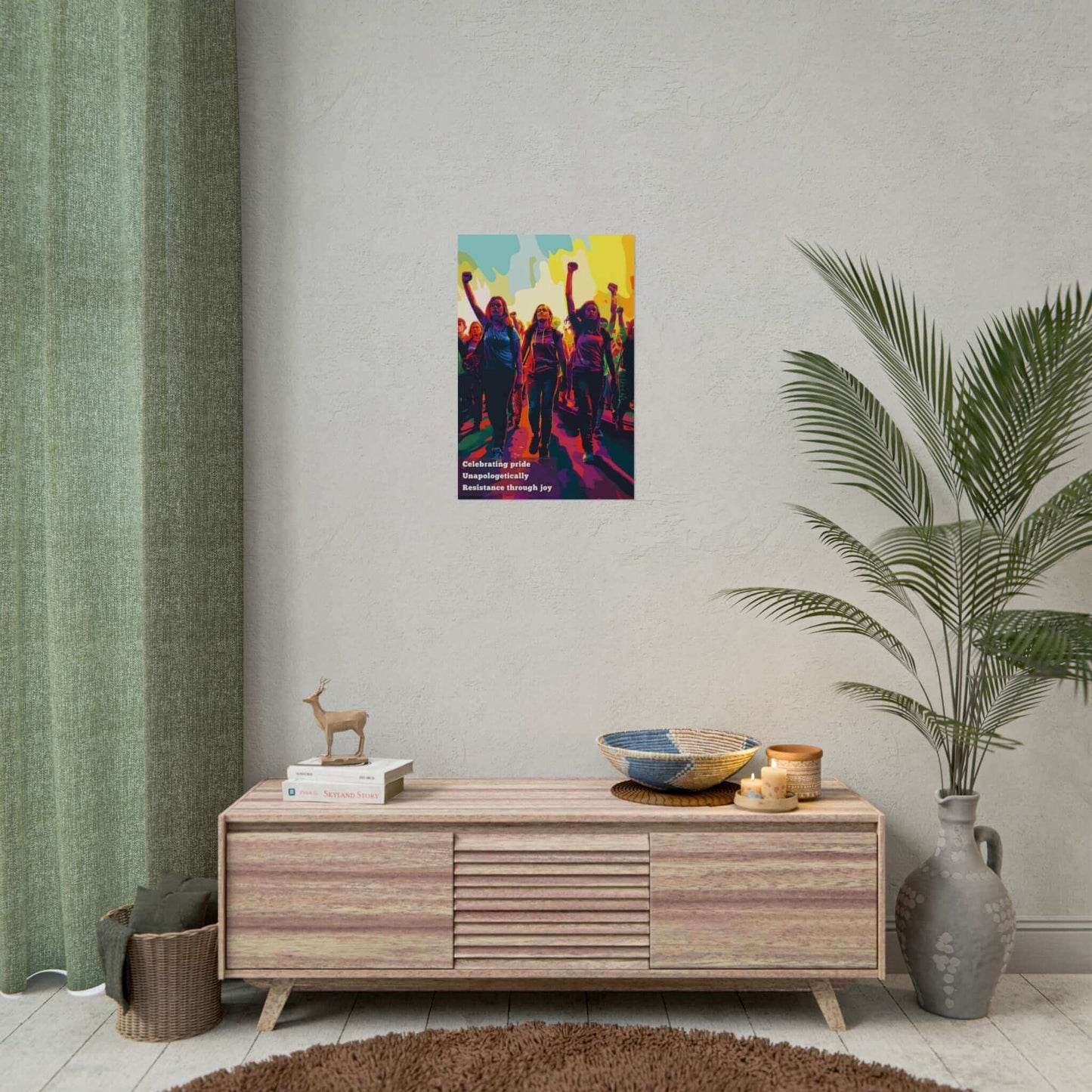 Vibrant Pride poster wall art of individuals marching with fists raised, celebrating resistance and joy, above a modern wooden console table.