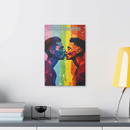 Printify's "Living Fully: Vibrant Gay Pride Canvas Wall Art, Inspired by Joyful 6-Word Story | PR-6W-006c" features an expressive and artistic painting of two men leaning in for a kiss against a rainbow gradient background. The text at the top reads, "Out and proud, living life fully!" rendered with bold and dynamic brushstrokes to celebrate love vibrantly.