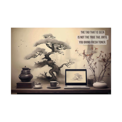 A workspace includes a laptop, a cup, a teapot, a stack of books, and a plant. An Asian-Inspired Poster Wall Art with Bonsai & Clever Haiku by Printify blends seamlessly with the real objects. The humorous Asian-themed text reads, "The Tao that is seen is not the true Tao, until you bring fresh toner.