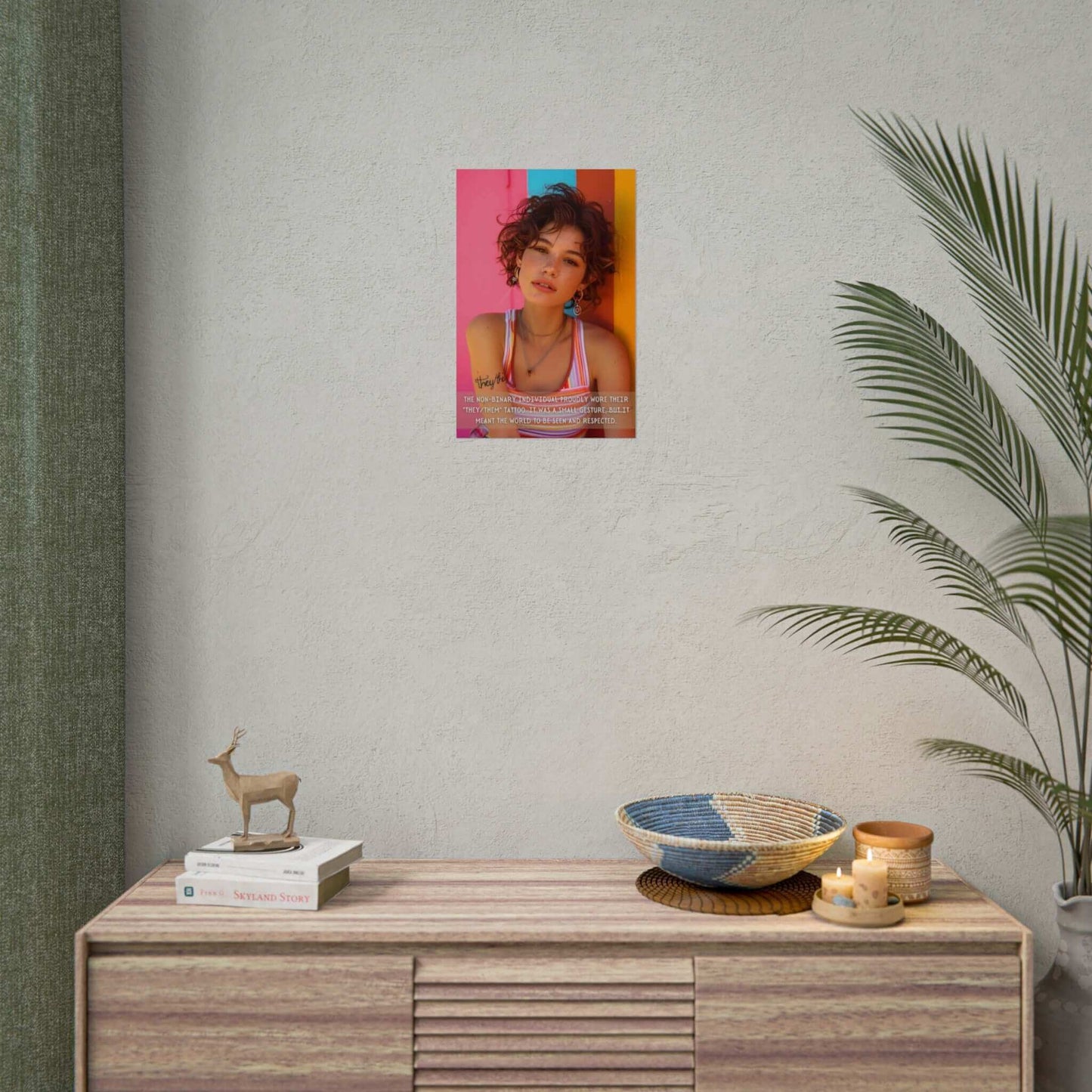 A person with short, curly hair and freckles stands against a multicolored wall, wearing a striped tank top and jewelry. They have a tattoo on their arm that reads "they/them." Text on the image reads: "The non-binary individual proudly displayed their 'They/Them' tattoo. It was a small gesture, but it meant the world for their self-expression to be seen." Featured in the scene is Printify's "They/Them: Bold Gay Pride Poster Wall Art, Inspired by Meaningful 2-Sentence Story | PR-2S-007p."
