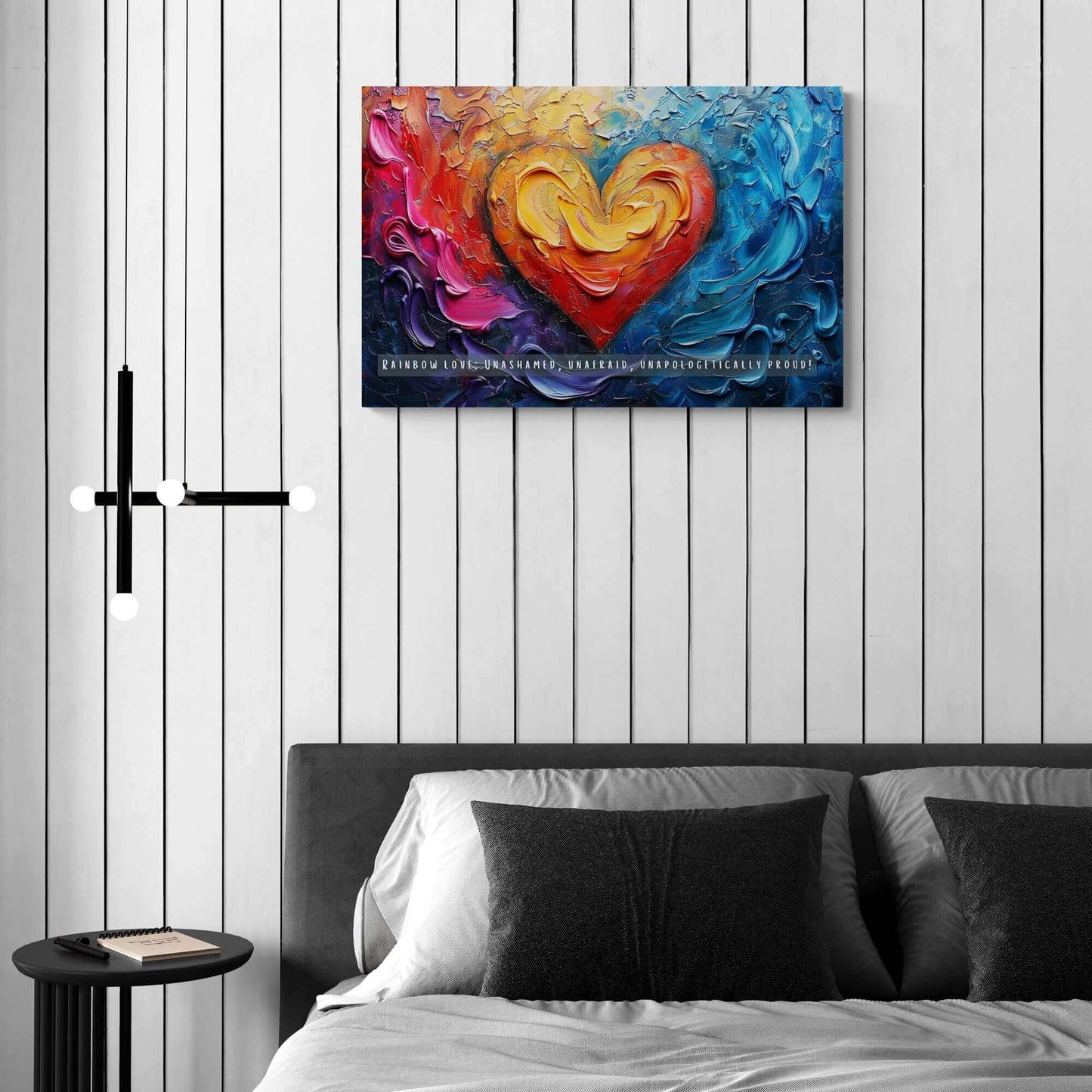 The Rainbow Love: Bold Gay Pride Canvas Wall Art by Printify (PR-6W-004c) features a vividly colorful painting with a heart at the center, surrounded by swirling abstract patterns in shades of red, orange, yellow, blue, and purple. At the bottom, it proudly displays the text: “RAINBOW LOVE: UNASHAMED, UNAFRAID, UNAPOLOGETICALLY PROUD!”—a vibrant celebration of diversity and pride within the LGBTQ+ community.