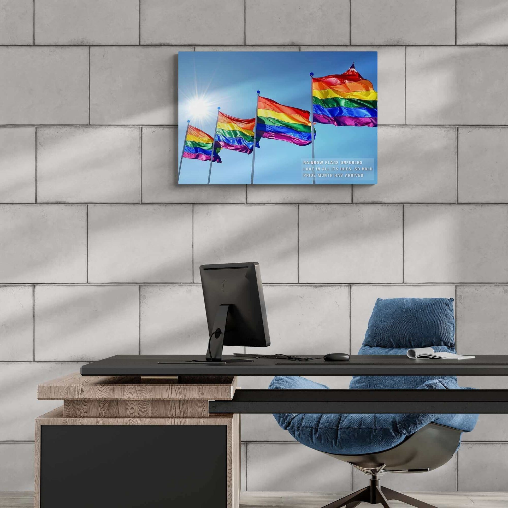 Four **Bold Rainbow Flags Poster Wall Art** wave in the breeze under a clear blue sky with the sun shining brightly. The text overlay reads, "Rainbow flags unfurled, Love in all its hues, so bold," celebrating Pride Month for the LGBTQ+ community. Created by **Printify**, this inspired piece of decor is perfect for commemorating Pride Month.